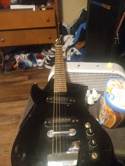 Black guitar 35 bucks works