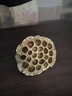 Gold painted metal bee home decor
