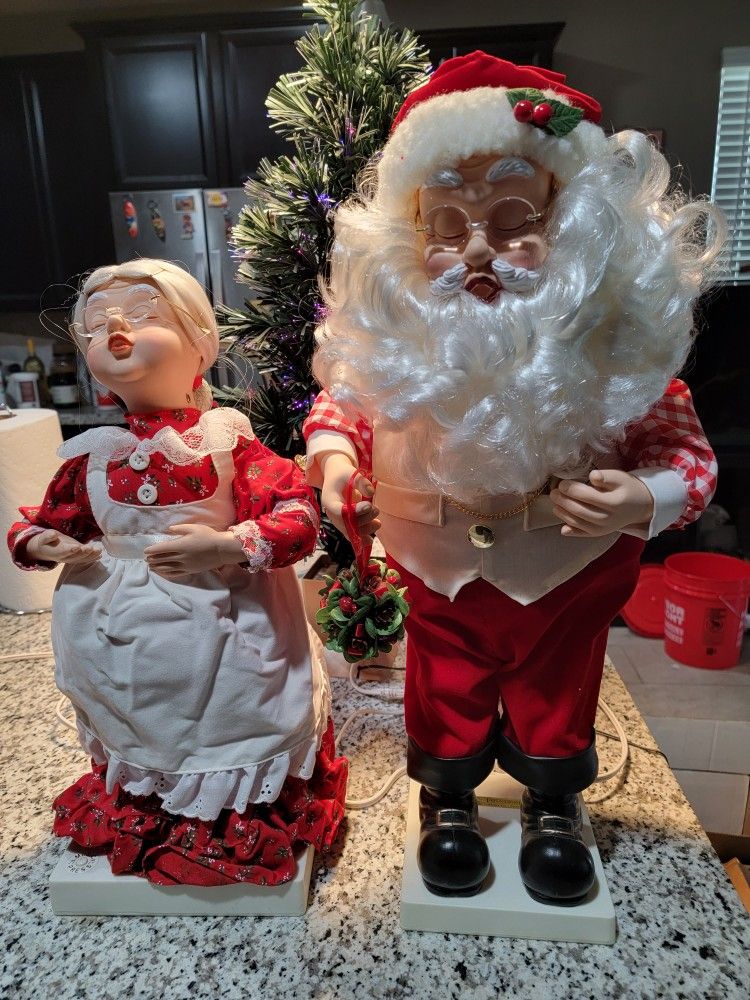 Vintage Telco Mommy Kissing Santa Clause Motionettes