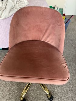 Pink and gold rolling desk chair