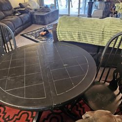Solid wood table and 2 chairs.