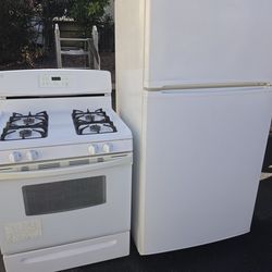 Refrigerador and stove  both in good condition