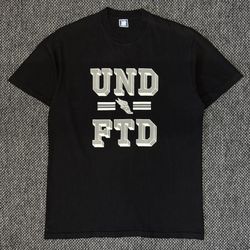 UNDEFEATED “RUNNING CIRCLES AROUND THEM” TEE