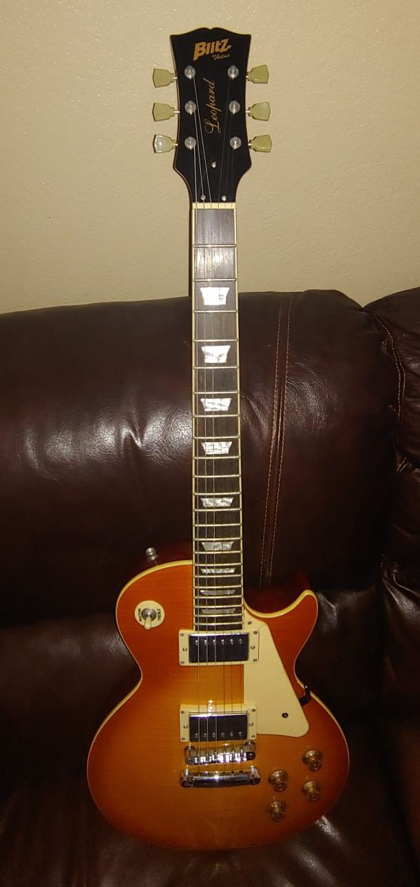 Beautiful Aria Pro II Blitz Leopard Les Paul Style Electric Guitar.