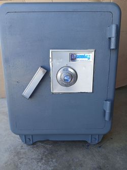SAFE, by Sentry.   23" x 17" with steel wheels