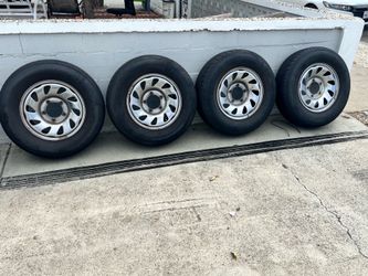 5 5x5.5 chrome stock wheels with 215 tires and spare