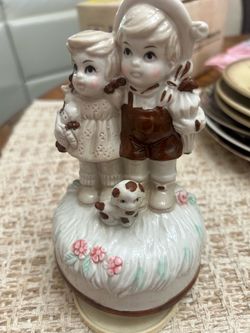 Porcelain Children Figurine Music Box