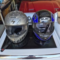 2 Motorcycle Helmets $20 Each Small And XL