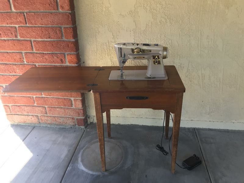 Antique singer wood table sewing machine