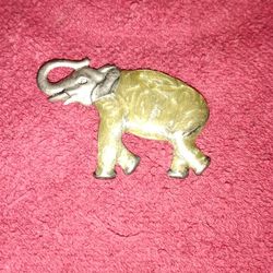 vintage pewter elephant brooch or lapel pin. 