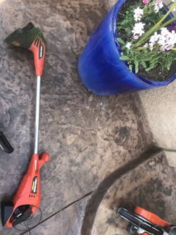 Used weed wackers 1 electric and one battery