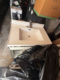 Bathroom vanity…toilet & bathroom tiles! Will separate