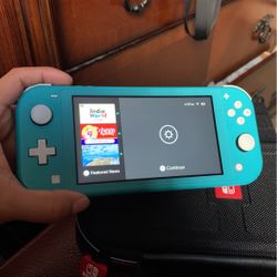 Nintendo Switch Lite (64gb sd card)