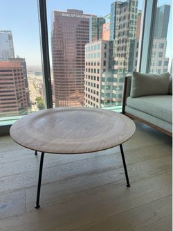 Coffee table, 34” round wood w/metal legs - from Design Within Reach