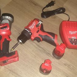 Milwaukee M12 Drill Two Batteries W Charger And Bag