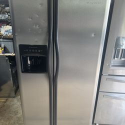 Energy Star Rated Frigidaire side by side refrigerator stainless steel