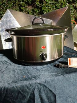 Manual oval slow cooker (often referred to generically as a Crock-Pot).