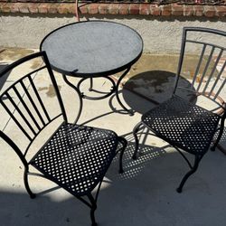 Bistro Table And Two Metal Chairs