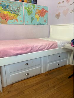 White twin bed with removable drawers