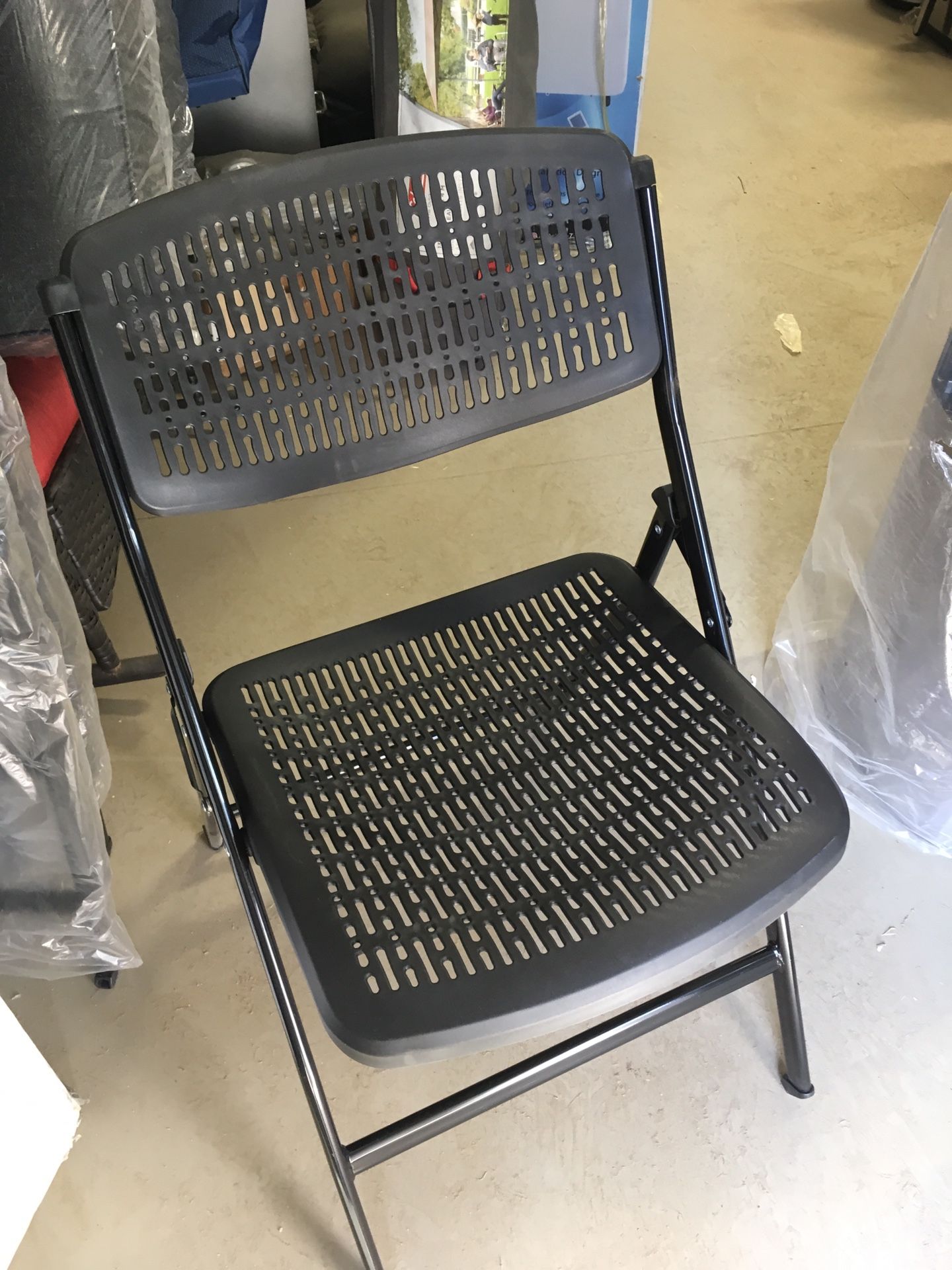 Set of 4 black fold up chairs