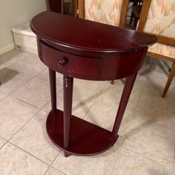 half-moon accent table featuring a convenient single drawer and a lower display shelf needs repair  PICK UP IN DEER PARK 77536