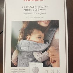 BabyBjörn Baby Carrier Mini in a pearly pink mesh (brand new). 