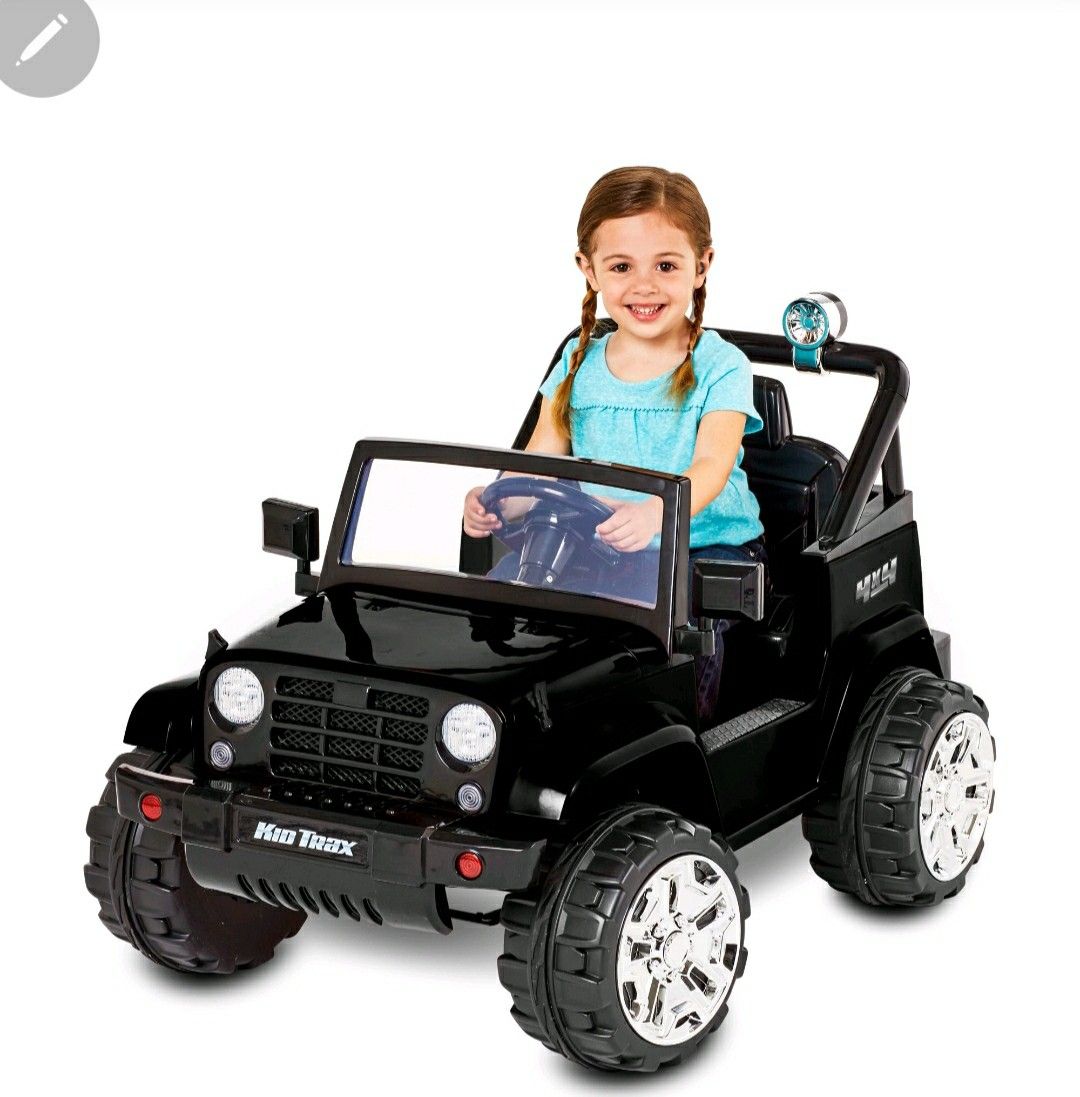 Brand new battery operated ride on Jeep