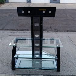 TV stand w/ glass shelves (3)