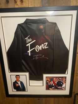 Framed Fonz jacket autographed by Henry Winkler