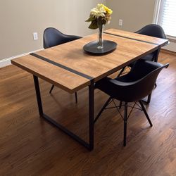 Table And Three Chairs 