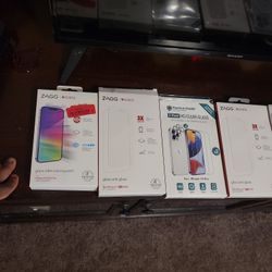 Lot Of 4 Screen Protectors And Iphone Cases 
