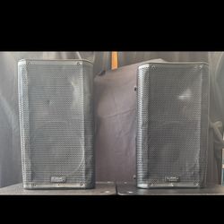 Pair of QSC K12 speakers w/bags