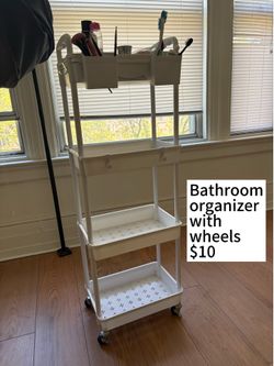 Bathroom organizer shelf with wheels