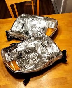 05-11 Toyota Tacoma NEW PAIR headlights chromed PAR de faros delanteros nuevos 2005 - 2011 tacoma