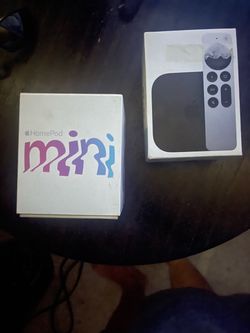 Apple TV box, home pod mini white , and home pod black