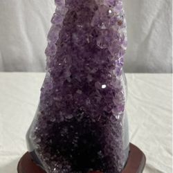 New, Price Firm, Amethyst Tower in a wooden base  