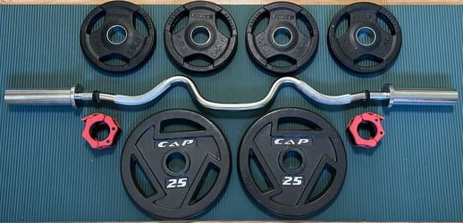 Weight Lifting Set (25 lb plates, 5.5 lb plates, curl bar w/ clips)