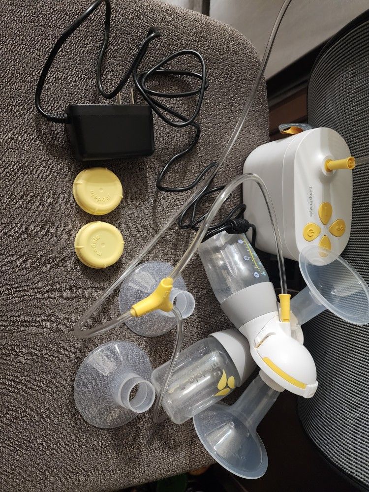 Medela Pump in Style Breastpump Stools. Used. The pump works good, but it has a crack which was taped.