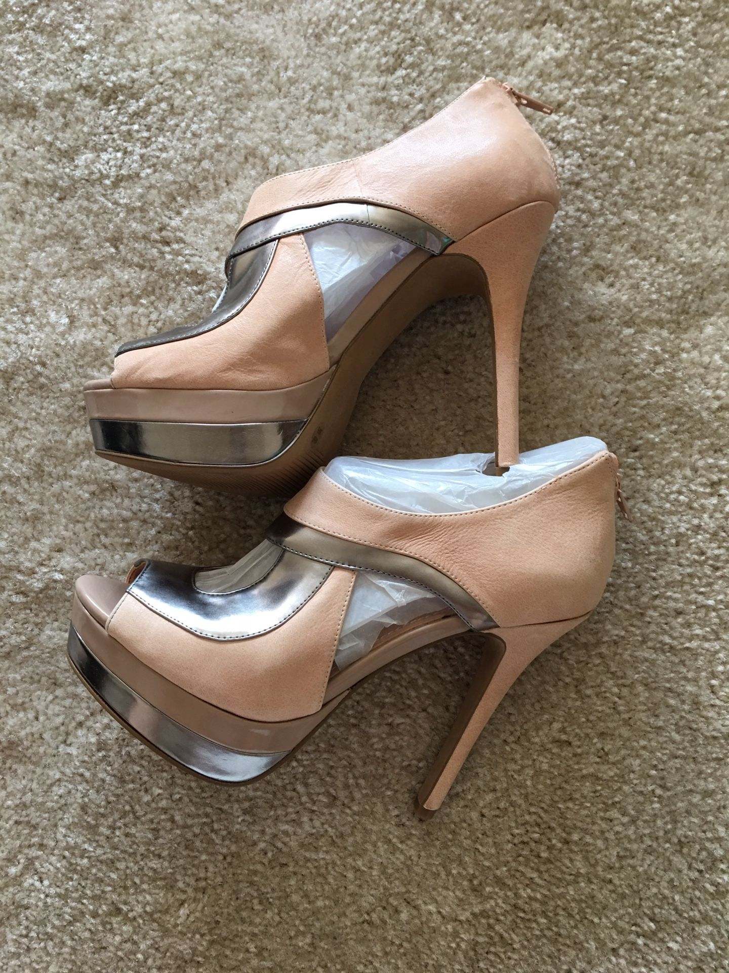 Brand new high heels. Size 6.5/37. For Party and dress up