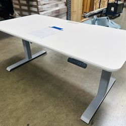 Brand new electric height adjustable table by vari desk, 30 x 60”, never used still in box