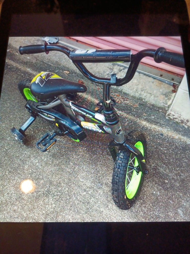 HUFFY 12 INCH ROCK IT. KIDS BIKE GREY