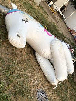 Inflatable sprinkler unicorn