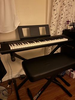 Yamaha Piano with stand and bench