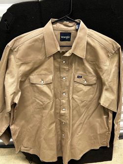 Wrangler men's cowboy cut work shirt is a khaki long-sleeve western style with pearl snaps