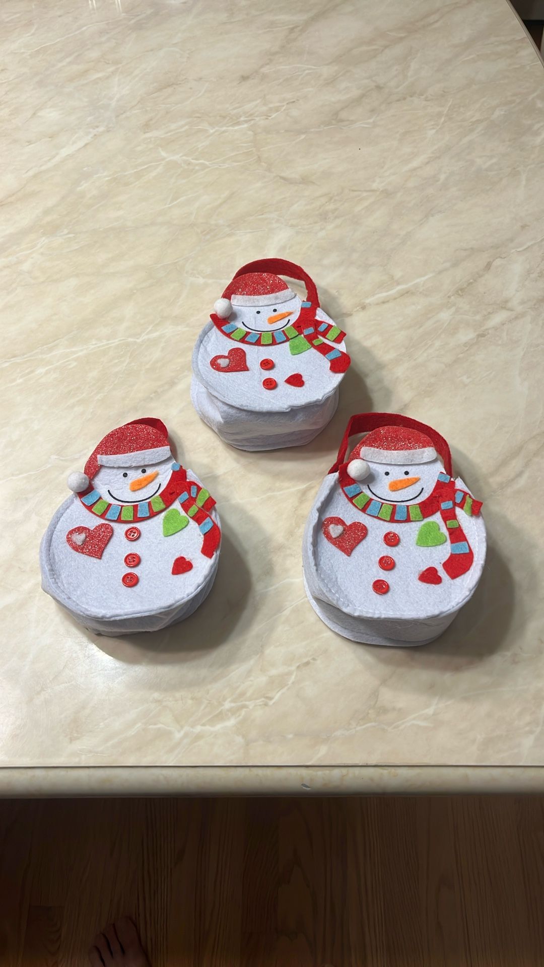 Three reusable snowman Christmas pouches bags