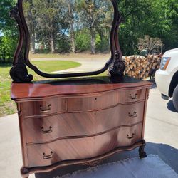 Gorgeous Vintage Mahogany Dresser on Casters with Curved Front,  Mirror and Lots of Carvings