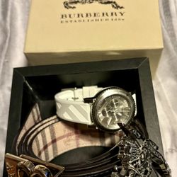 Brand new FIRM!! beautiful white band Burberry sapphire Crystal watch I think they’re going for around 700 and matching Burberry belt with two buckles