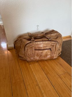 Vintage beautifully patina leather expandable weekend duffel bag