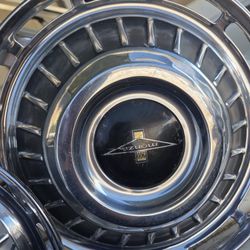 vintage Chevrolet Corvair Monza hubcap, likely from a 1962 or 1963 model, featuring a 13-inch diameter.