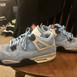 Air Jordan 4 Retro "University Blue" (often called the "UNC 4s").